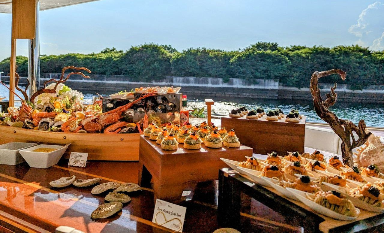 Luxurious sushi and sashimi dining spread curated by Yacht Maison chefs in Singapore
