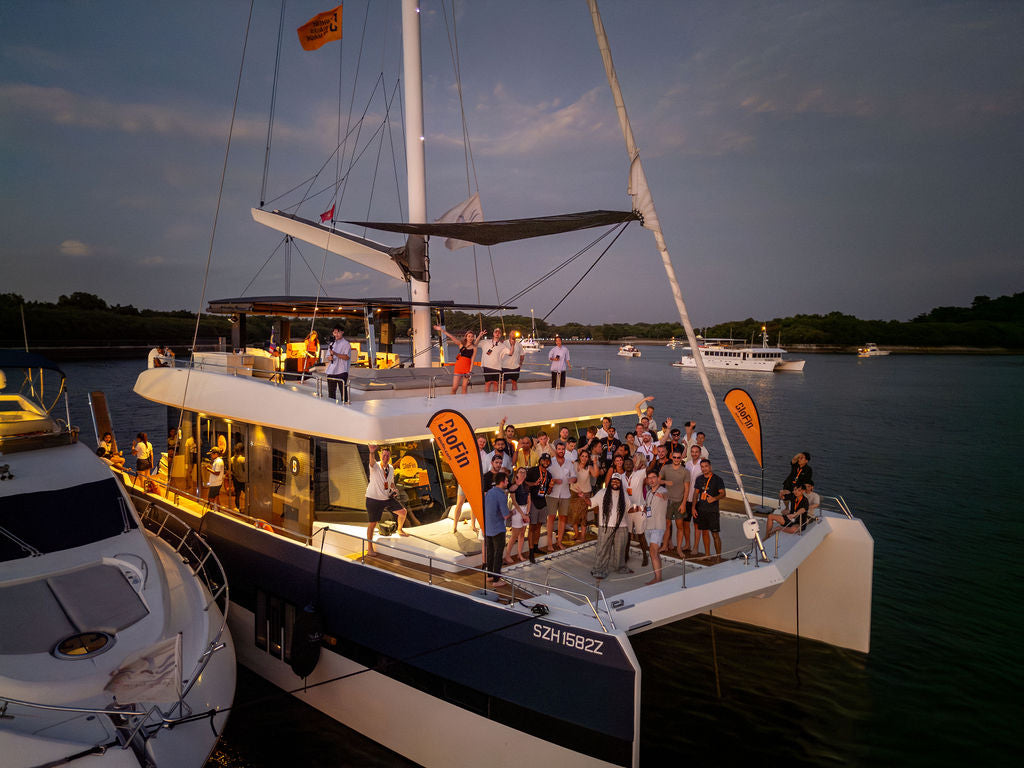 Corporate yacht event with full branding on a Yacht Maison yacht in Singapore