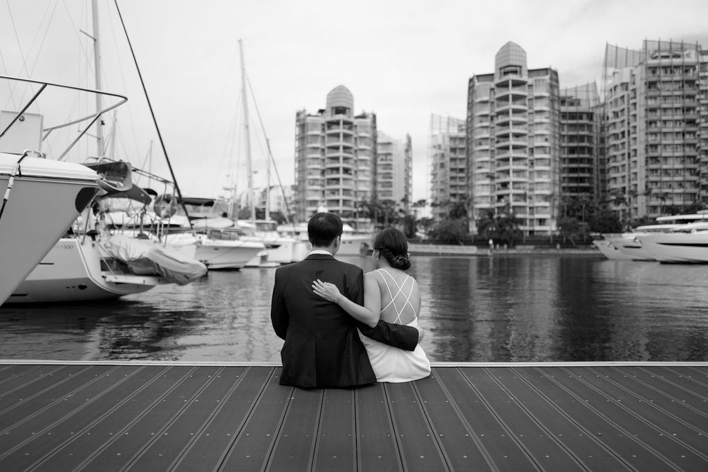 Couple exchanging vows at sea with Yacht Maison solemnisation in Singapore