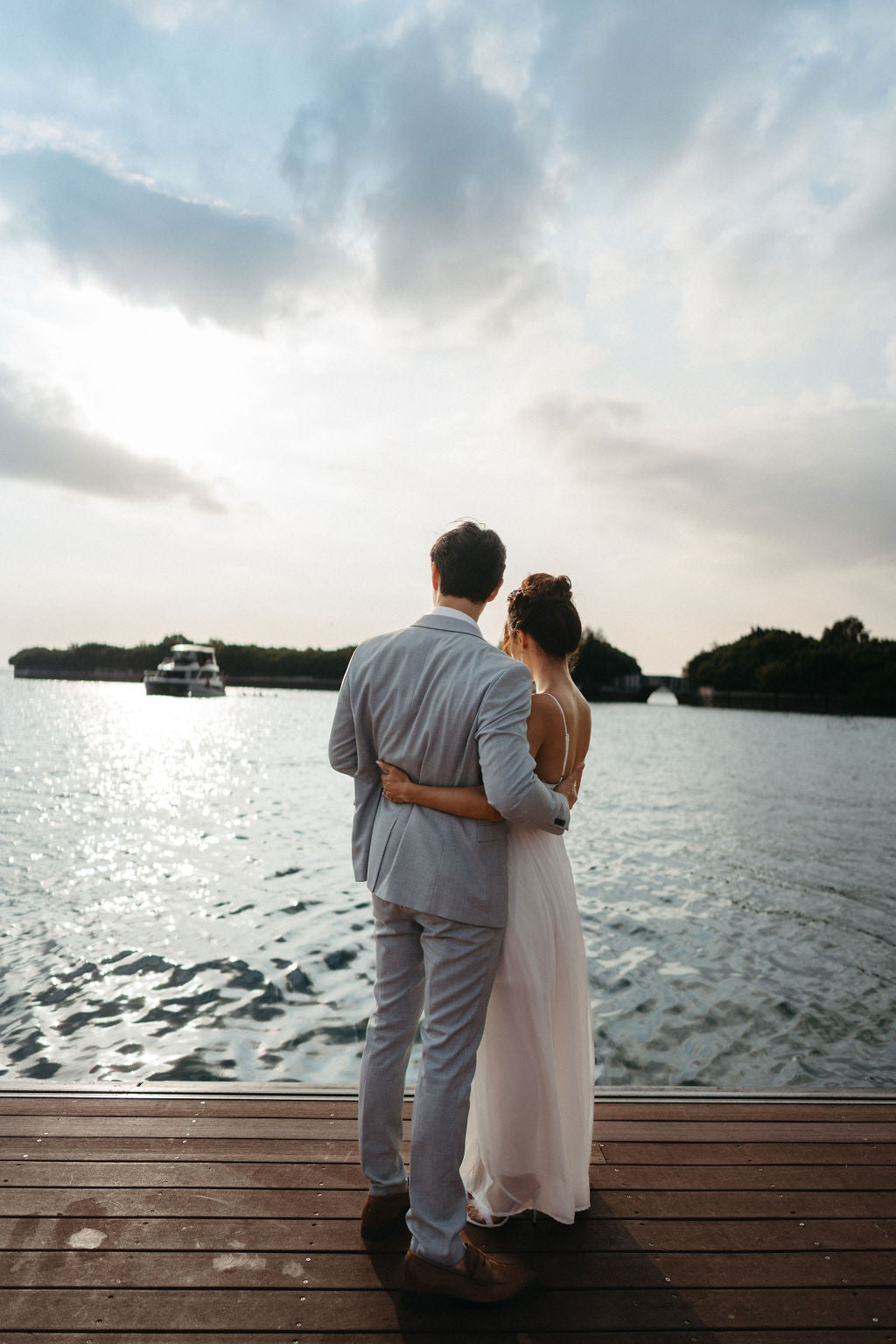 Couple celebrating early anniversary milestones on Yacht Maison charter in Singapore