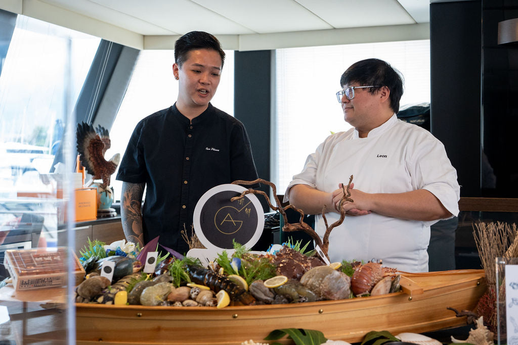 Chef-led live cooking experience on a Yacht Maison yacht in Singapore
