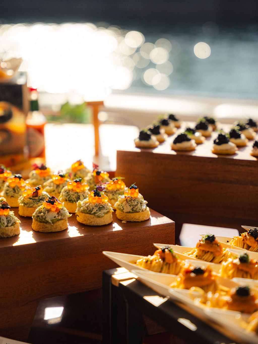 Premium canape sunset tasting menu on a Yacht Maison yacht in Singapore