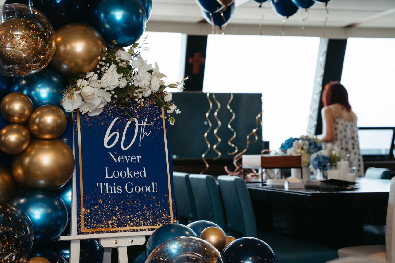60th birthday celebration with custom decor on a Yacht Maison charter in Singapore