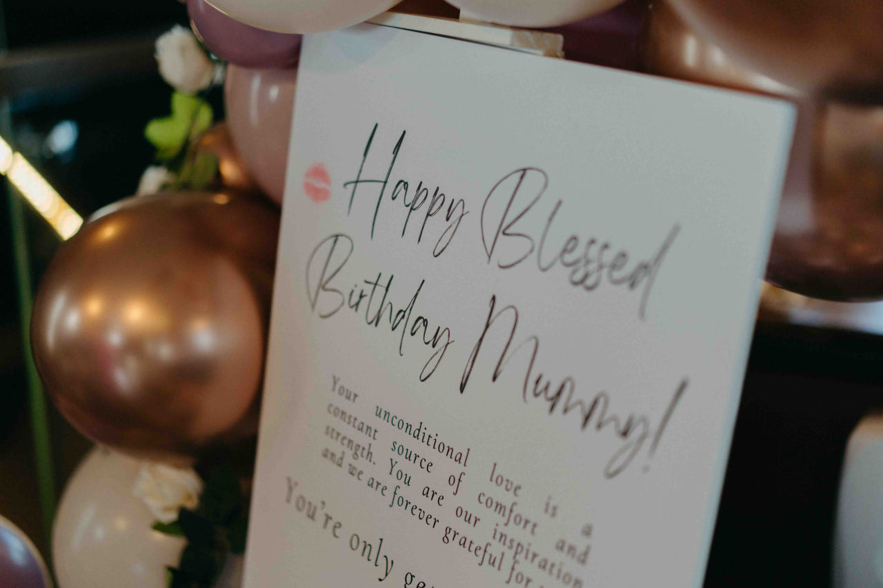 Personalised birthday card and balloon setup planned by Yacht Maison in Singapore